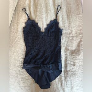 CAMI NYC Sheer lace body suit.